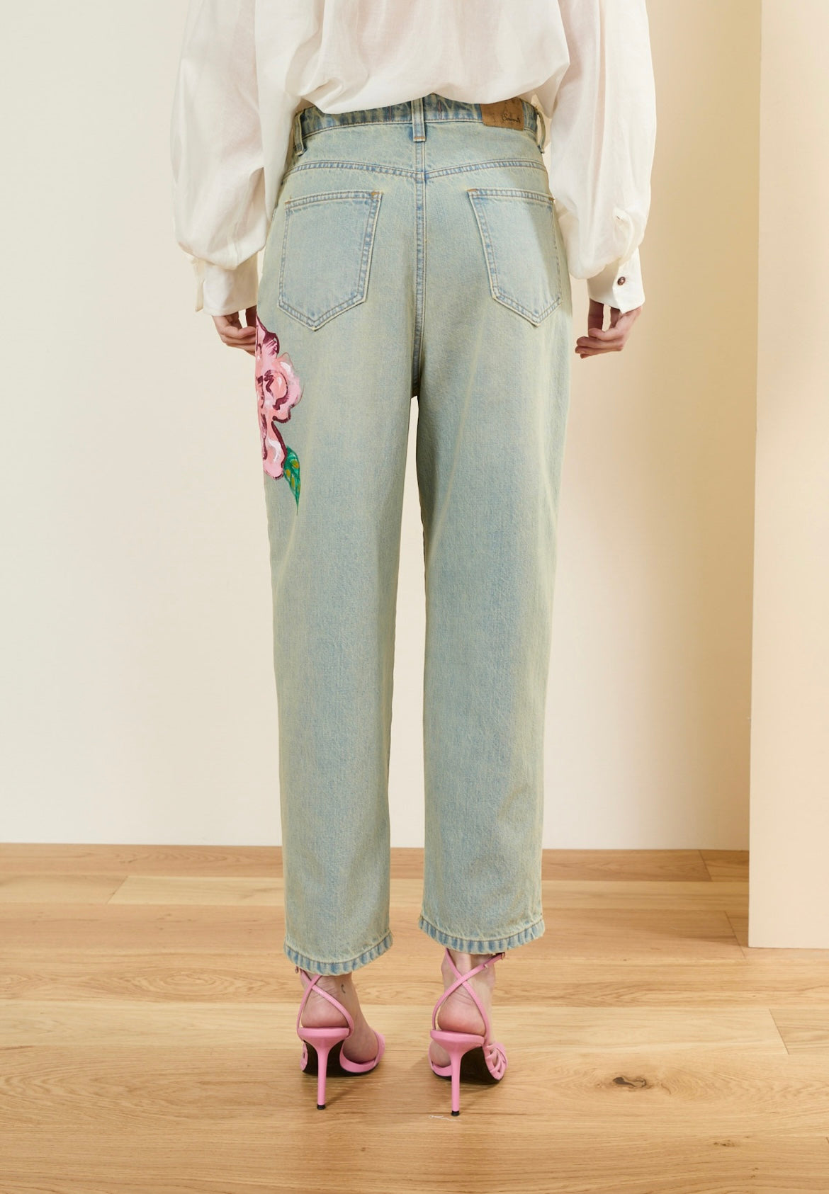 Souvenir Pantalone jeans con fiore dipinto